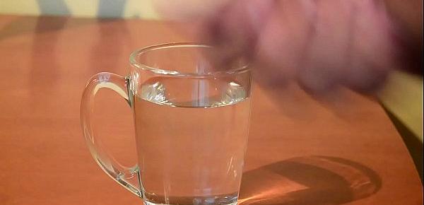  Cumming into glass of water